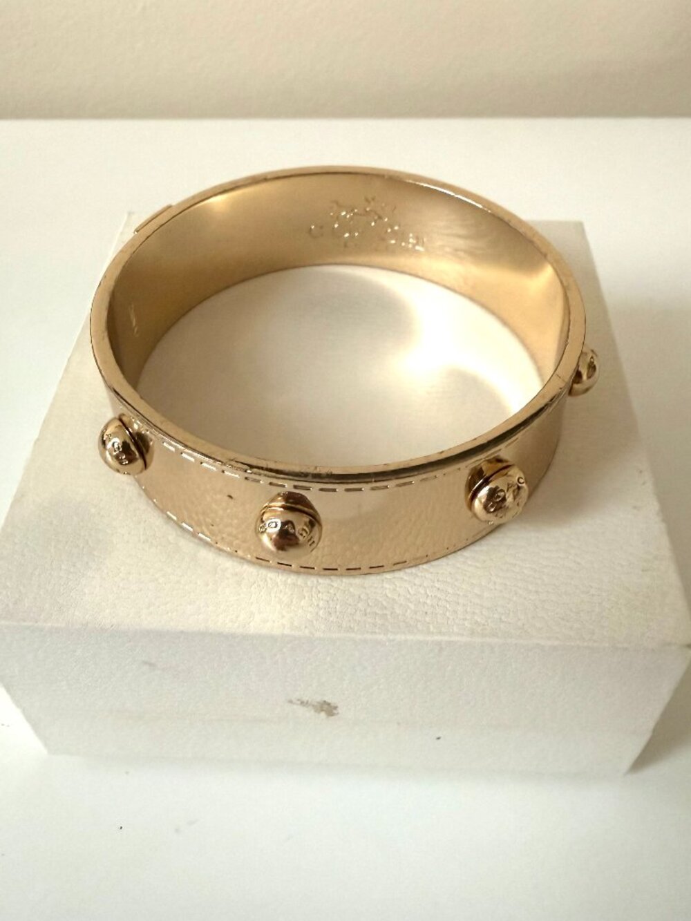 Gold COACH bangle